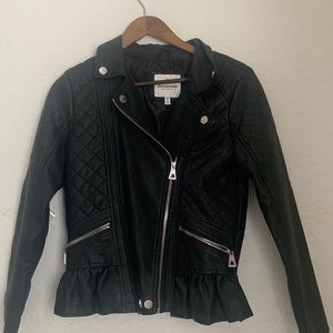 Black Leather Jacket With Zippers and Buttons Fringe At The End And Textured